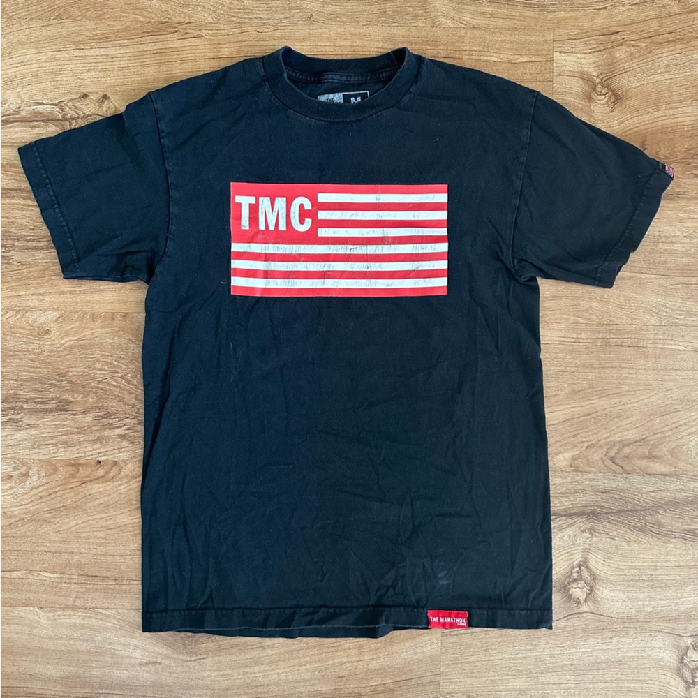 The Marathon Continues TMC Nipsey Hussle Flag T shirt